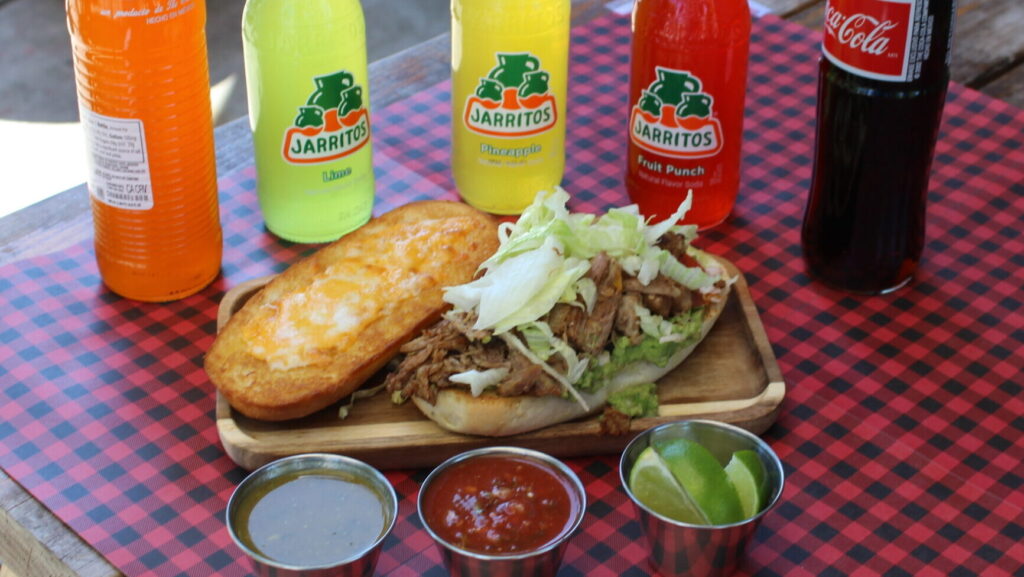 Mexican tortas served with bottled drinks at Los Tacos Locos